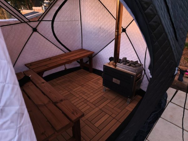 TwigGo sauna tent lifestyle TwigGo portable sauna tent in an outdoor setting