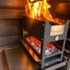 TwigGo Ember Oven 3 TwigGo Ember Oven with flames burning in the firebox